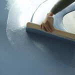 Garnet sand as compression and wear-resistant floor aggregate